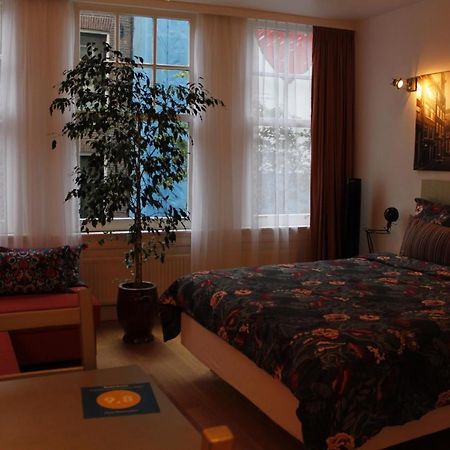 Huis Roomolen อัมสเตอร์ดัม ภายนอก รูปภาพ